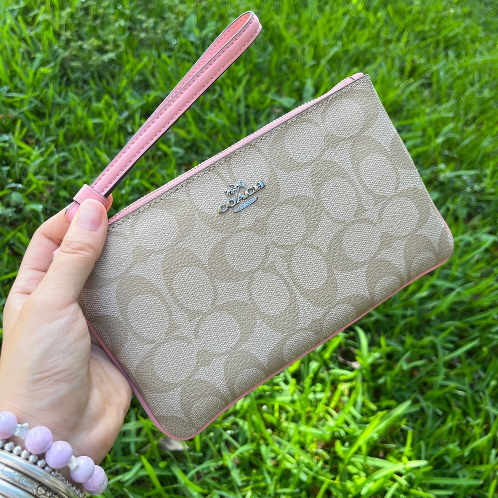 Coach Large Wristlet In Signature Canvas pink